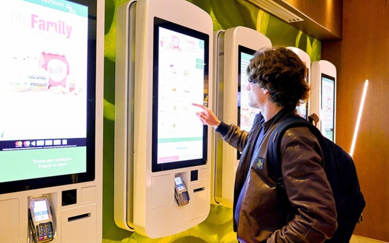 customer using all-in-one kiosk